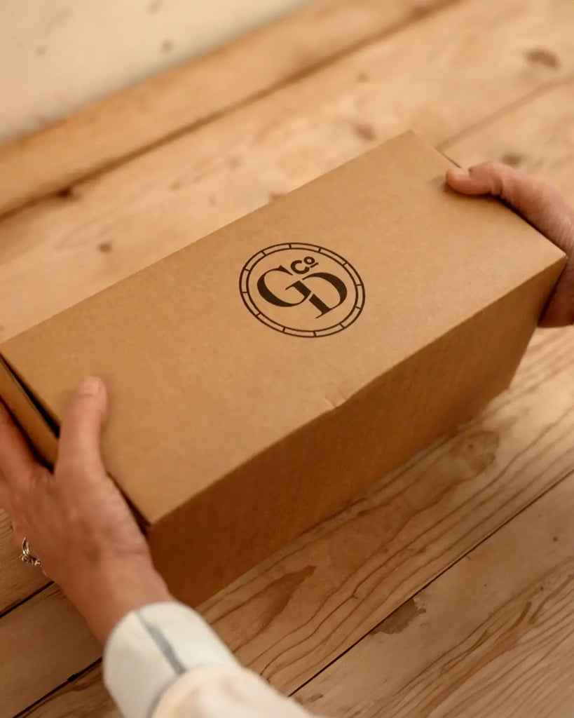 Cardboard packing with the Gattertop Monogram logo on, Earth Day 2024